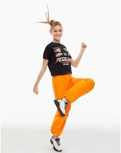 Оранжевые спортивные брюки трансформеры Parachute для девочки Gloria jeans