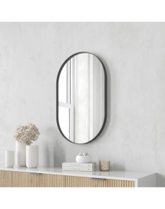 Дизайнерское настенное зеркало nolvis s в тонкой металлической раме черного цвета черный 51x81x4 см Genglass