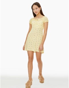 Жёлтое расклёшенное платье с цветочным принтом для девочки Gloria jeans