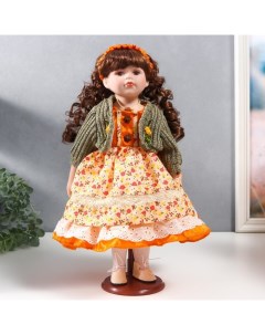 Кукла коллекционная керамика Вера в платье с мелкими цветами и зелёном джемпере 40 см Nobrand