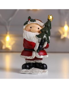 Сувенир полистоун Дед Мороз в красной шубе с ёлочкой 10 5х5 5х7 см Nobrand