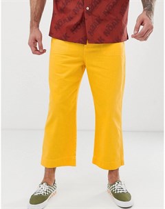 Укороченные джинсы с широкими штанинами темно желтого цвета Noak
