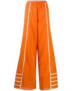 Pierantoniogaspari расклешенные брюки с контрастными полосками 42 оранжевый Pier antonio gaspari