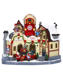 Новогодний сувенир Магазин игрушек с поездом, LED анимация, адаптер, 30х19х24 см Timstor