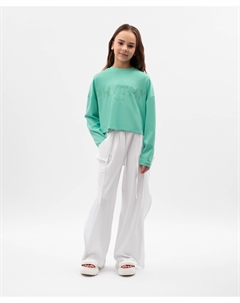 Брюки-трубы для девочки трикотажные с отлетными деталями белые Gulliver