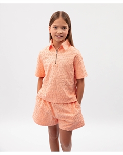 Поло с коротким рукавом для девочки оверсайз из фактурного махрового трикотажа коралловое Gulliver