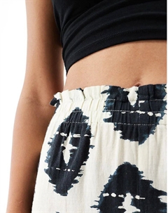 – Брюки прямого кроя бежевого цвета с ацтекским принтом, комплект Mango