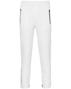 Зауженные брюки с логотипом, белый Prada