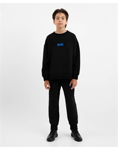 Брюки-джоггеры трикотажные с принтом чёрные для мальчика Gulliver