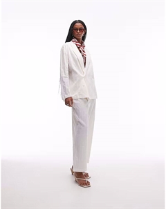 Комбинируемые брюки из льна плиссе белого цвета Mango