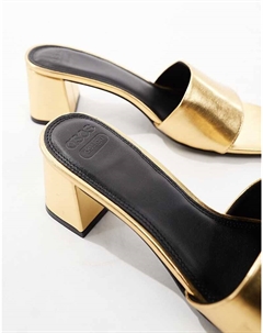 DESIGN – Hundred – Золотые туфли-мюли с необычным каблуком Asos