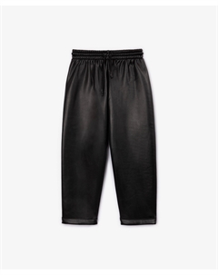 Брюки из эко-кожи с резинкой на поясе и манжетами черные Gulliver