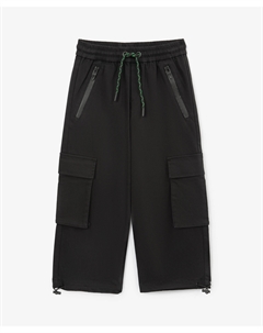 Брюки текстильные для мальчика с карманами-карго и утяжками по низу чёрные Gulliver