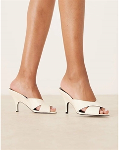 Босоножки на каблуке с перекрестными ремешками из кожи цвета слоновой кости Mango