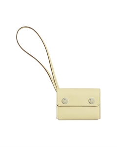 HERMES Картхолдер nap из кожи Swift женский цвет Milton Yellow Hermès