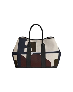 HERMES Сумка женская Pacific из холста с кожей телёнка Negonda в цвете индиго и светло-бежевом и бежевом и чёрном Hermès