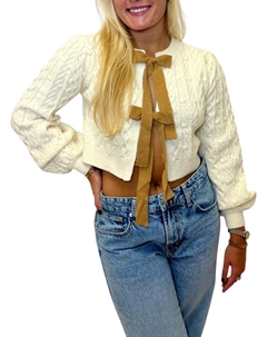 Осенний свитер с бантом в кремовом цвете Storia