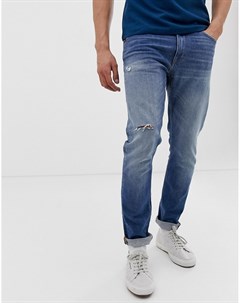 Светлые зауженные джинсы с рваной отделкой Tiger of sweden jeans