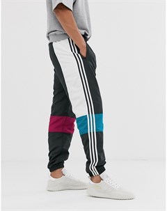 Белые спортивные брюки асимметричного кроя Adidas originals