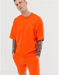 Ярко оранжевый спортивный костюм с топом с короткими рукавами и шортами Asos design