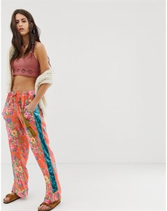 Свободные брюки с цветочным принтом и бархатными полосами по бокам Aratta