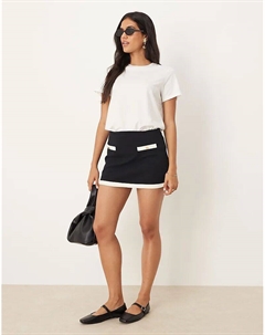 Контрастная мини-юбка из хлопка в черно-белой гамме Mango