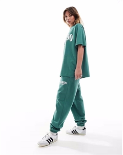 Спортивные брюки с манжетами и принтом Colorado зеленого цвета Asos design