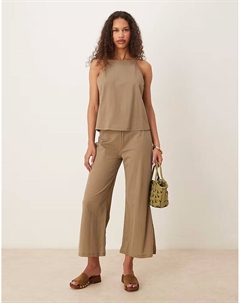 Комбинированные брюки из смеси льна с эластичной талией и широкими штанинами бежевого цвета Mango