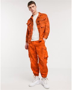 Оранжевые брюки карго с камуфляжным принтом Vintage Milk it