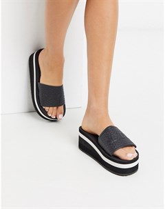 Черные сандалии на плоской платформе с полоской Slydes