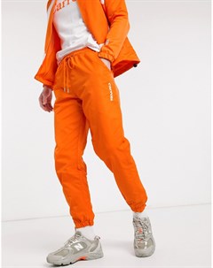 Оранжевые нейлоновые спортивные брюки Carrots
