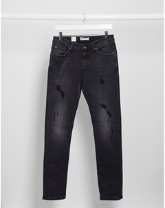 Черные рваные джинсы зауженного кроя Celio