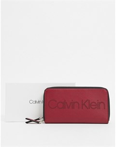 Красный кошелек с перфорированным логотипом Calvin klein