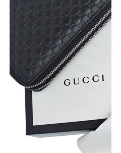 Портмоне из гладкой кожи с фирменным тисненым орнаментом GG Gucci